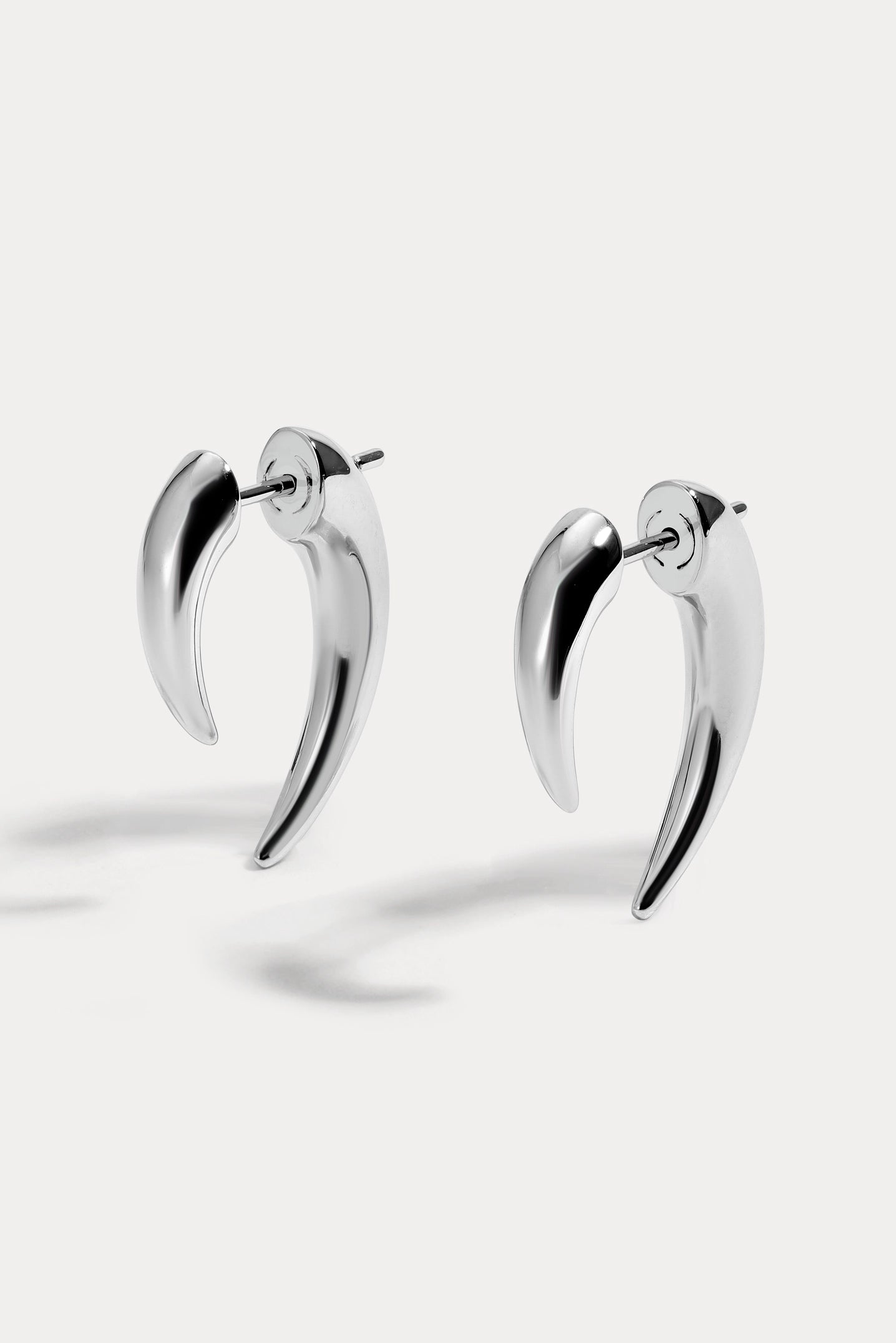 Lili Claspe, Tusk Earrings